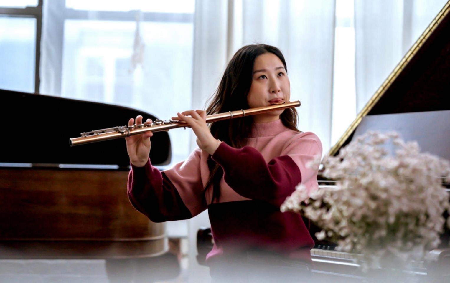 Participant engaged in focused improvisation practice
